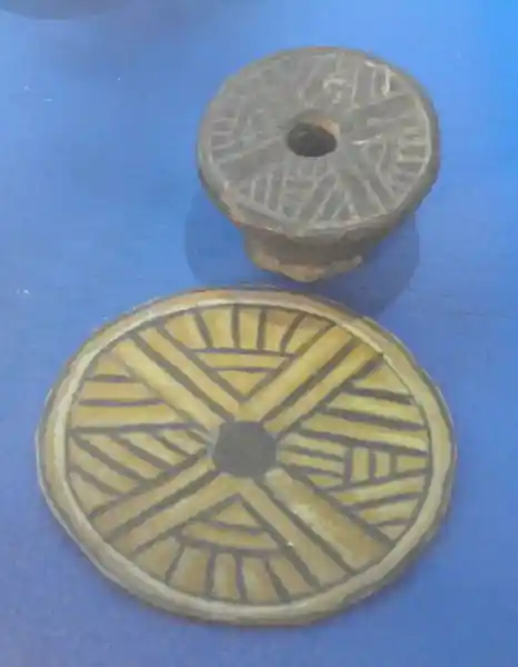 Solar disc, cross on top of eye symbol